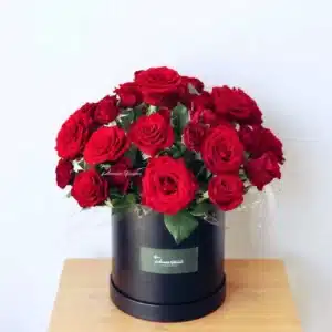 Boxed Love Romantic — premium red roses arranged in a luxury hat box