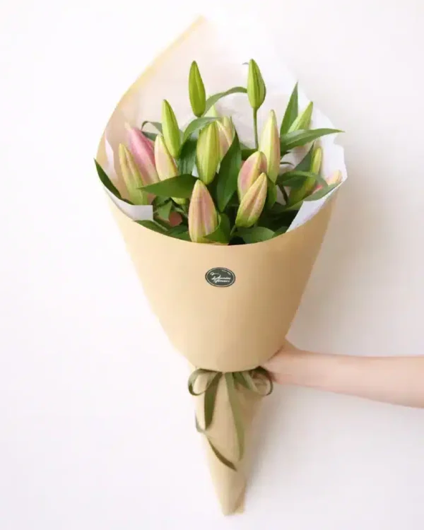 Pink oriental lilies delivered in bud, wrapped and styled by a Christchurch florist