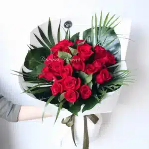 Vibrant Tropical Lover bouquet, red roses with exotic foliage, unique flower arrangement Christchurch.