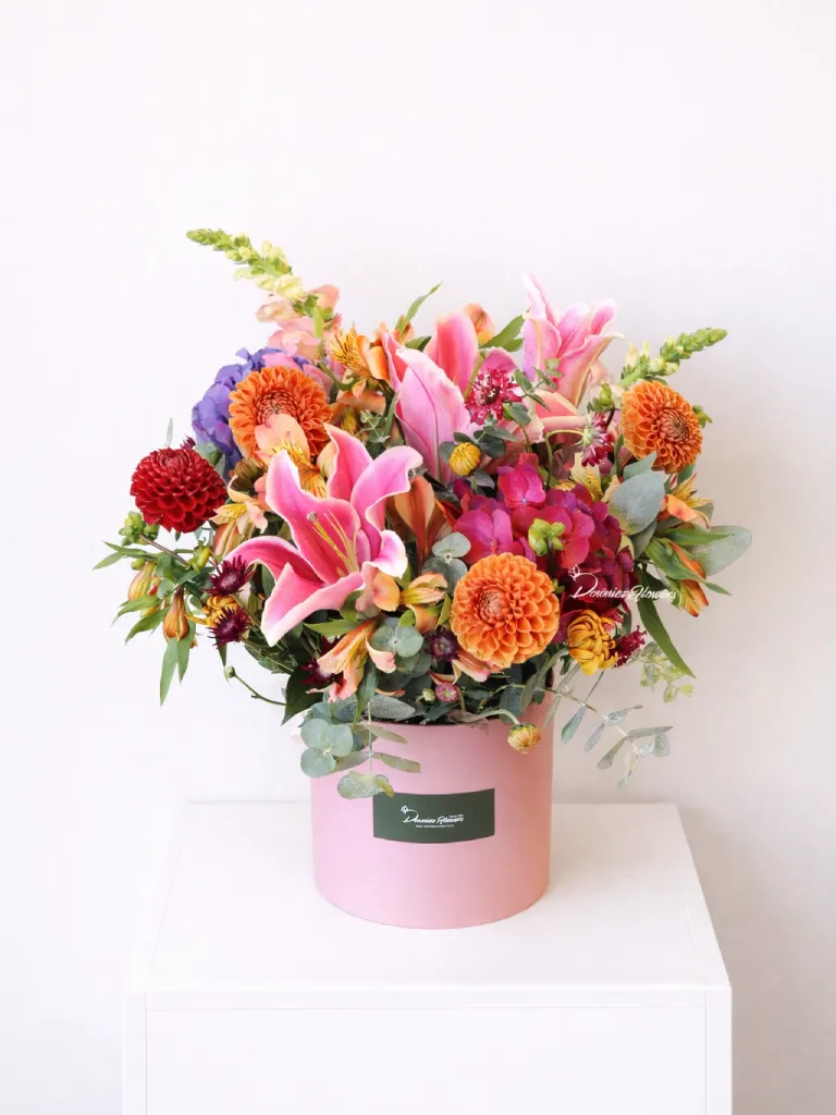 Bright colourful boxed flower arrangement, a beautiful gift for any occasion