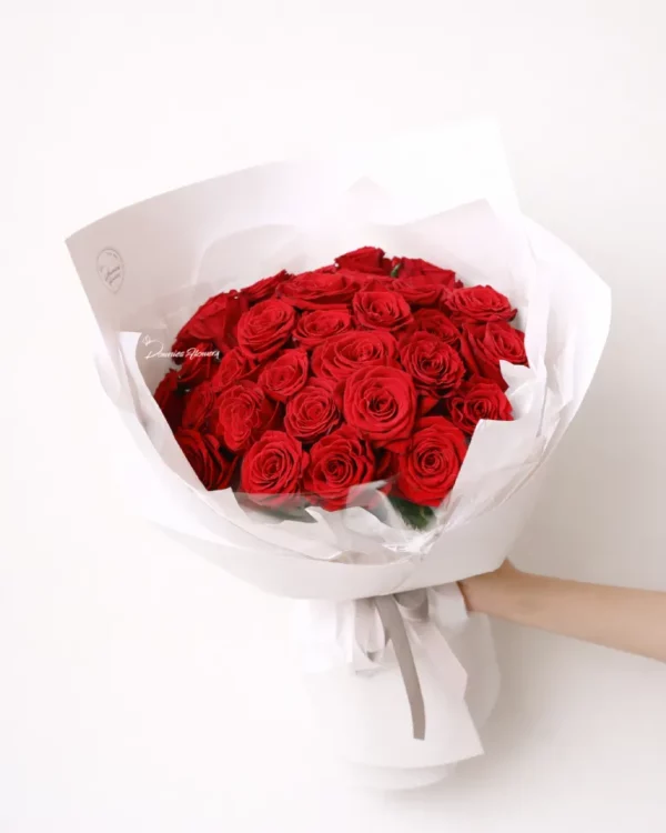 Full Heart bouquet — 30 red roses wrapped in white paper, luxurious and full
