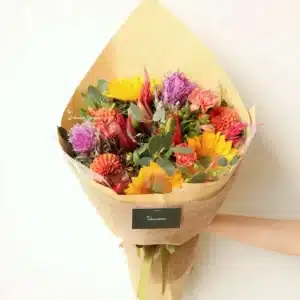 Minimal wrapped bouquet with fresh seasonal flowers – Christchurch florist